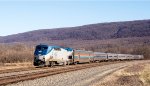 The westbound Pennsylvania puts in its daily appearance at Mexico Curve on the old PRR Middle Division